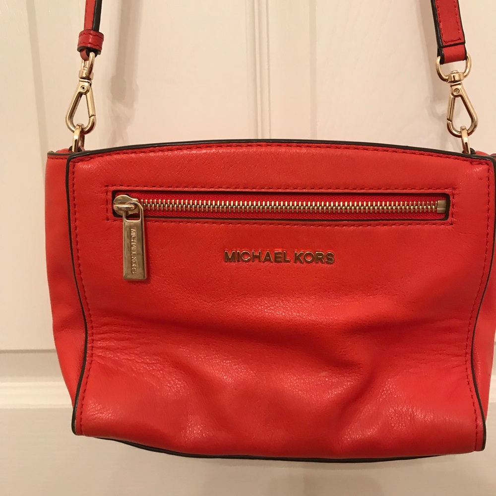 Orange Michael Kors crossbody bag